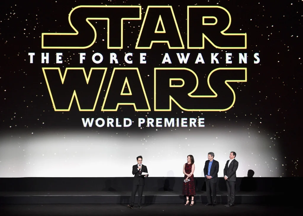 HOLLYWOOD, CA - DECEMBER 14: (L-R) Director J.J. Abrams, producer Kathleen Kennedy, chairman, The Walt Disney Studios, Alan Horn and president, The Walt Disney Studios, Alan Bergman speak onstage during the World Premiere of ?Star Wars: The Force Awakens? at the Dolby, El Capitan, and TCL Theatres on December 14, 2015 in Hollywood, California. (Photo by Alberto E. Rodriguez/Getty Images for Disney) *** Local Caption *** J.J. Abrams;Kathleen Kennedy;Alan Horn;Alan Bergman