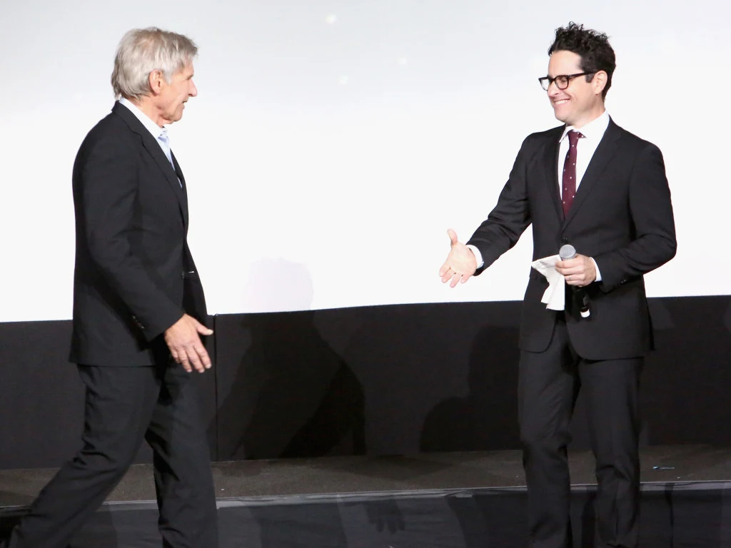 HOLLYWOOD, CA - DECEMBER 14: Actor Harrison Ford (L) and director J.J. Abrams attend the World Premiere of ?Star Wars: The Force Awakens? at the Dolby, El Capitan, and TCL Theatres on December 14, 2015 in Hollywood, California. (Photo by Jesse Grant/Getty Images for Disney) *** Local Caption *** Harrison Ford;J.J. Abrams